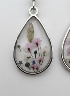 Håndlagde blomsterøreringer