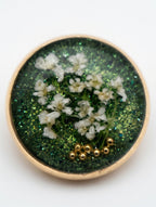 Håndlagde blomsterøreringer