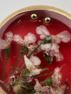 Håndlagde blomsterøreringer